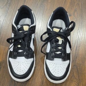 Nike Black and White Low-Top Dunks gently used size 4.5Y unisex